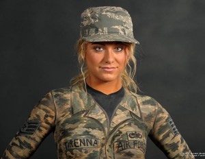 Models are body painted in military themes including army, navy, and marines